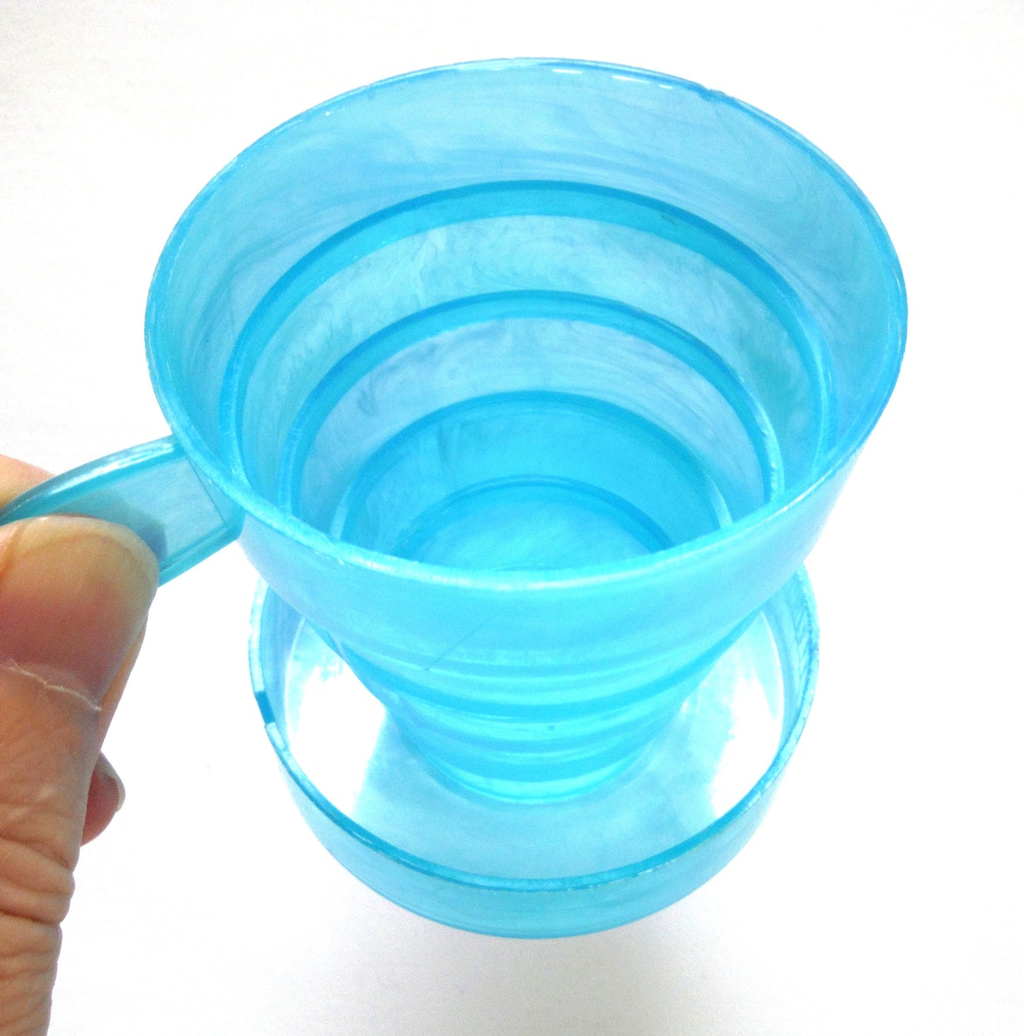 Vintage Portable Collapsing Travel Mug in Turquoise Blue: ROYAL CANADIAN MOUNTED POLICE, by "Collaps-A-Mug" of Hong Kong