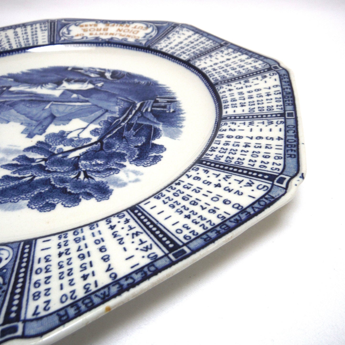 1931 Antique Decorative Calendar Plate by WOODS BURSLEM of ENGLAND: Gold Imprinted for Dion Bros. of Cut Knife, Saskatchewan