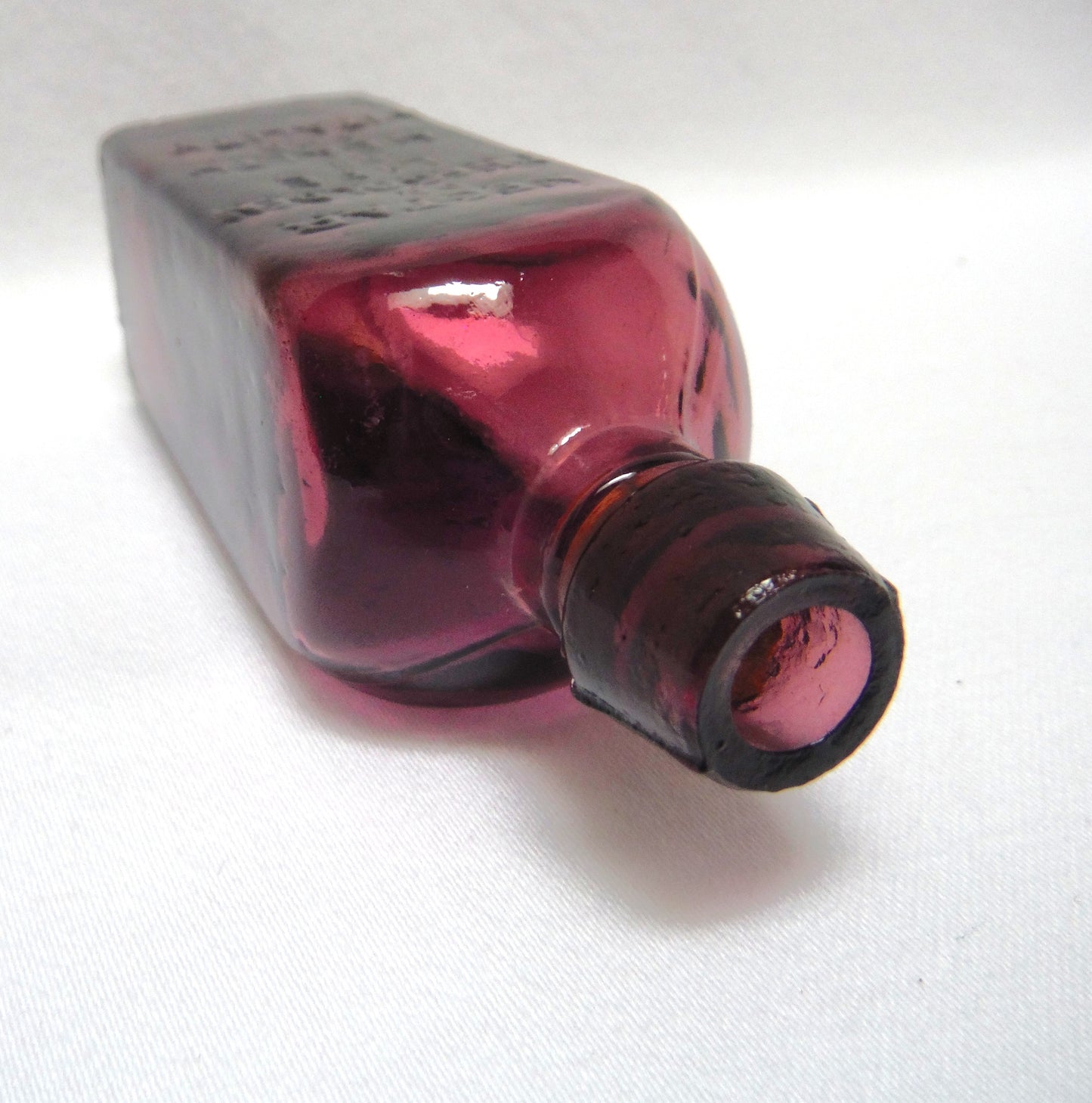 Vintage Miniature Purple Glass Bottle: "STRAUB HULLER'S TREE OF LIFE ELIXER SINCE 1880"