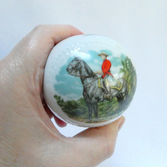 Vintage Ceramic White Baseball-Styled MEDICINE HAT MONEY BANK: Featuring The Royal Canadian Mounted Police (RCMP)