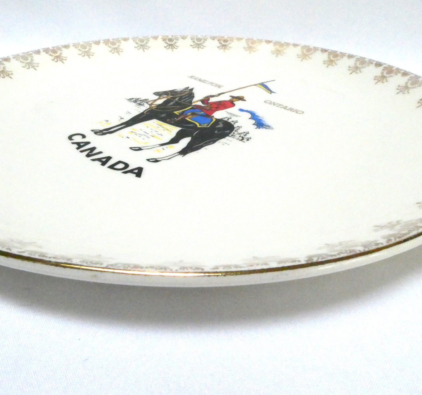Vintage Souvenir Large Ceramic Plate featuring the Famous RCMP (Royal Canadian Mounted Police) Rare Hamilton Ontario Canada Version