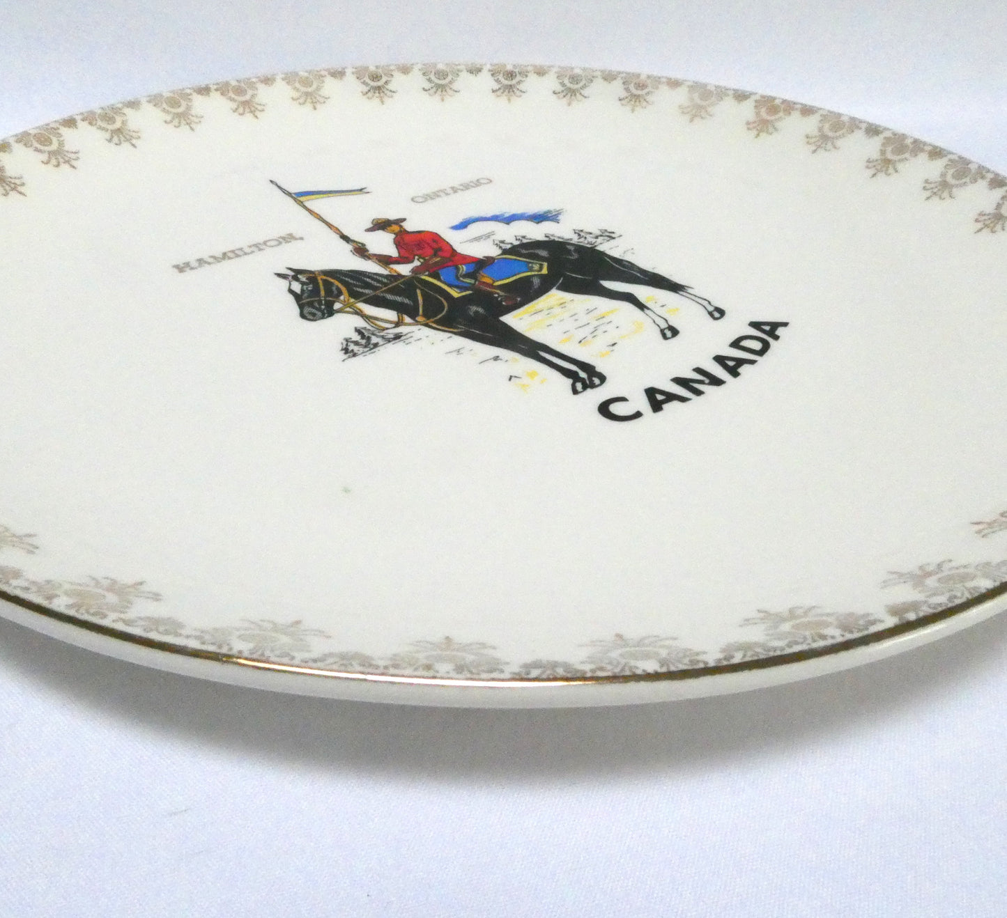 Vintage Souvenir Large Ceramic Plate featuring the Famous RCMP (Royal Canadian Mounted Police) Rare Hamilton Ontario Canada Version
