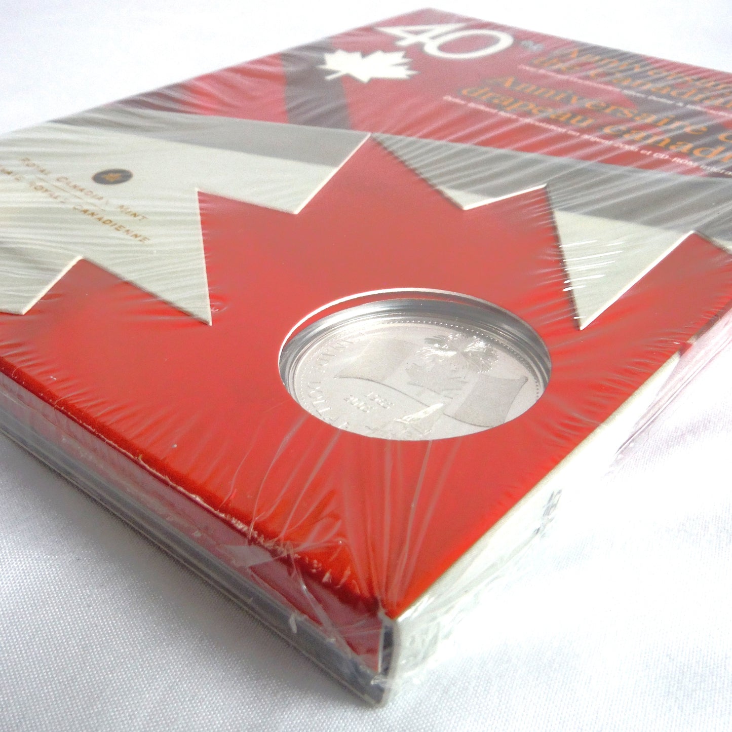 40th Anniversary of The Canadian Flag: A 2005 Brilliant Uncirculated Silver Dollar & Interactive CD-ROM!