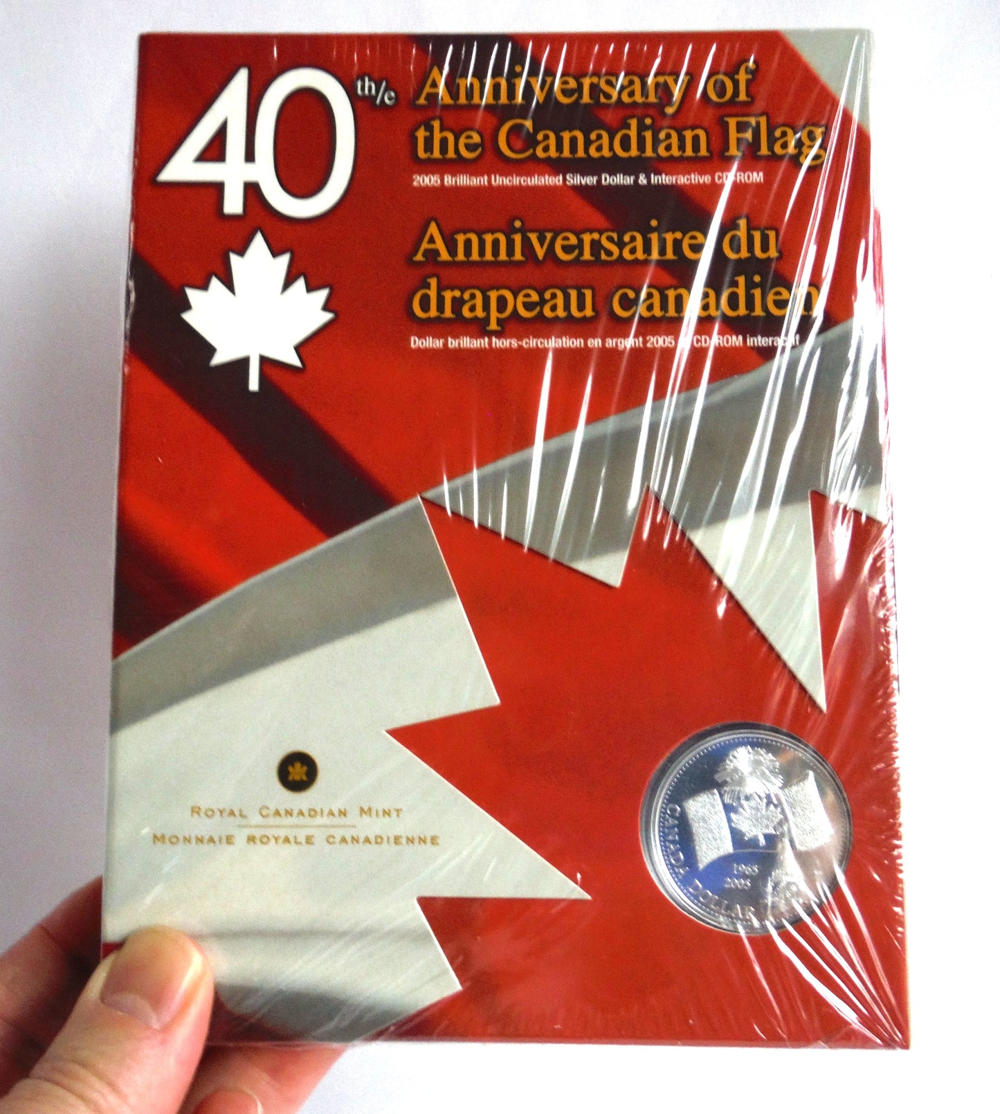 40th Anniversary of The Canadian Flag: A 2005 Brilliant Uncirculated Silver Dollar & Interactive CD-ROM!