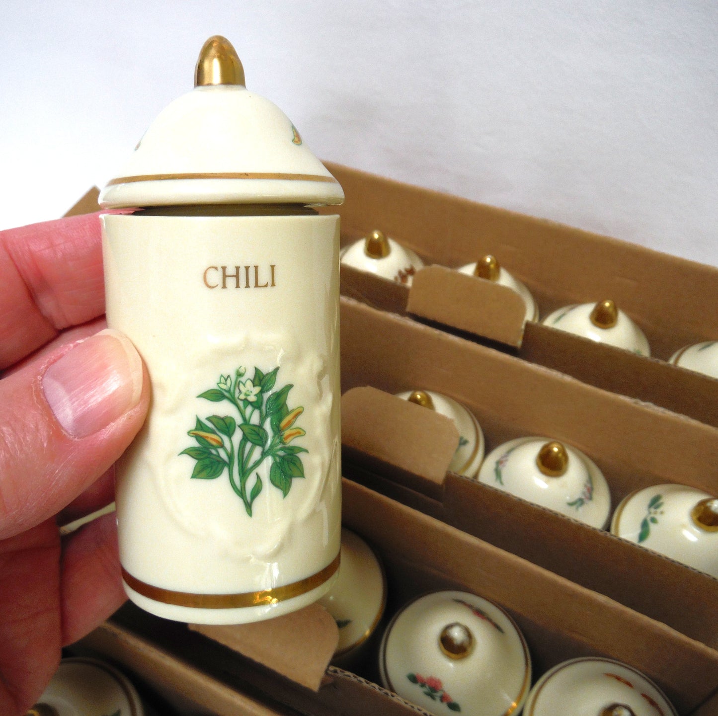 VINTAGE LENOX SPICE GARDEN SPICE JARS: Set of 19 Spice Jars, Crafted of fine Porcelain, Sculpted in Bas-relief, decorated by hand and embellished with 24K Gold.