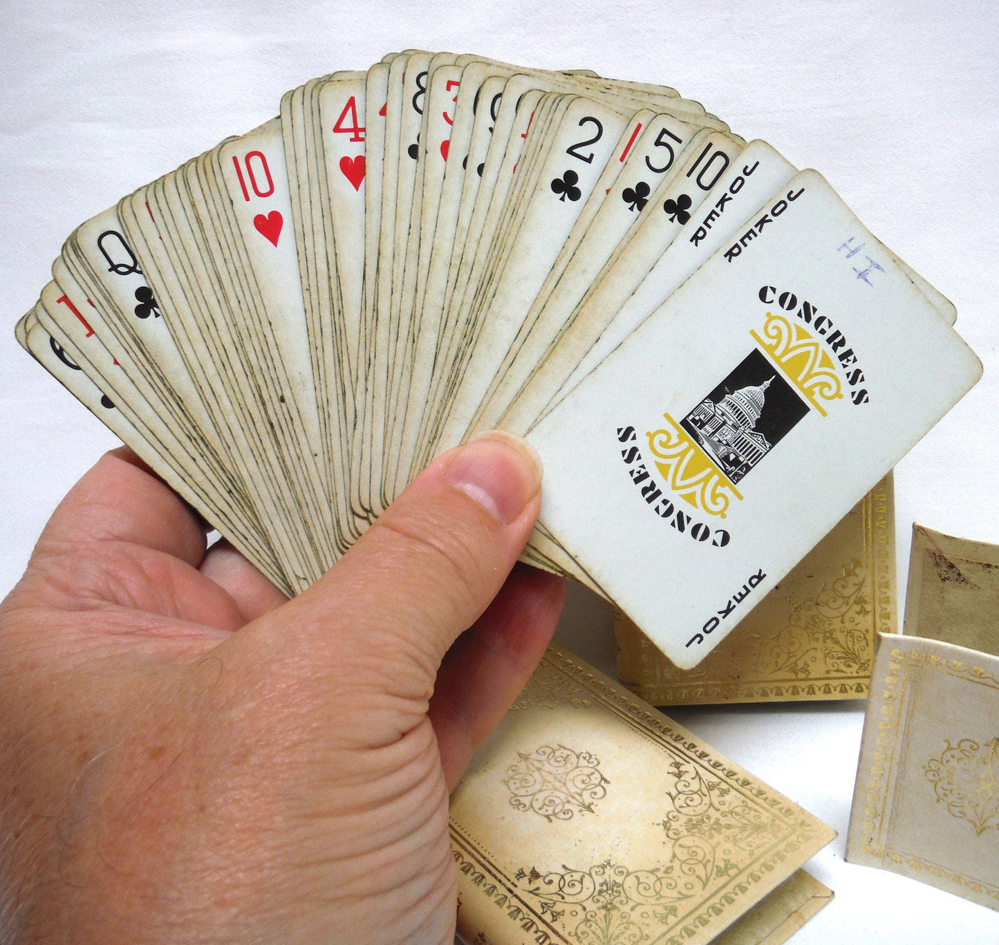 VINTAGE SET OF TWO CONGRESS PLAYING CARDS: In a Pair of Cream Leather Faux Books and Original Matching Book Holde