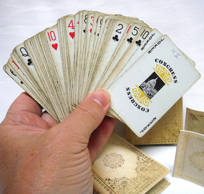 VINTAGE SET OF TWO CONGRESS PLAYING CARDS: In a Pair of Cream Leather Faux Books and Original Matching Book Holde