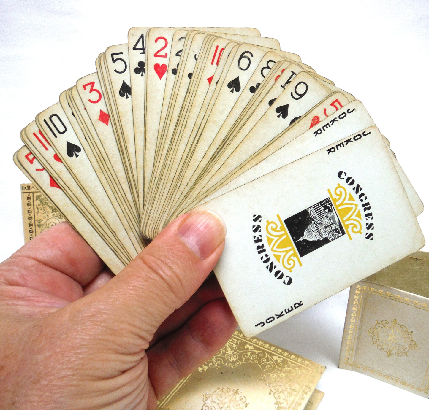 VINTAGE SET OF TWO CONGRESS PLAYING CARDS: In a Pair of Cream Leather Faux Books and Original Matching Book Holde