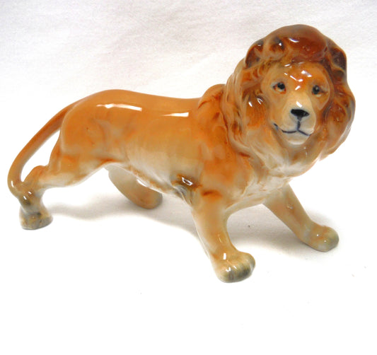 Vintage Porcelain Hand-Decorated Lion Pouncing Statue Figurine