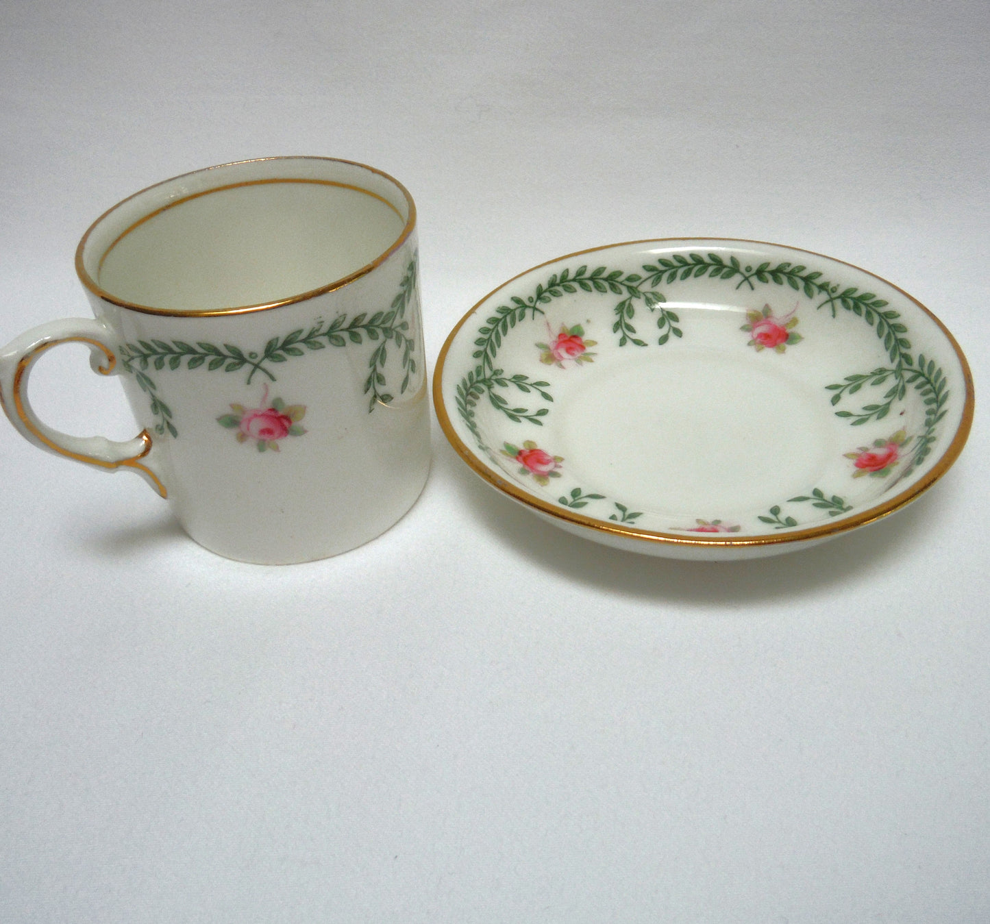 RARE 1910-1925 ANTIQUE DEMITASSE CUP AND SAUCER, in the ROSE AND GARLAND PATTERN From AYNSLEY of London, England