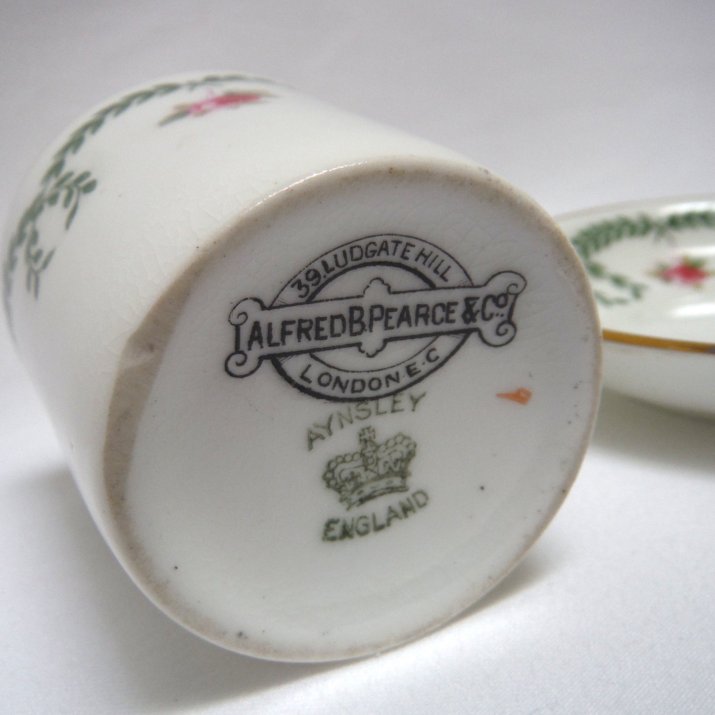 RARE 1910-1925 ANTIQUE DEMITASSE CUP AND SAUCER, in the ROSE AND GARLAND PATTERN From AYNSLEY of London, England