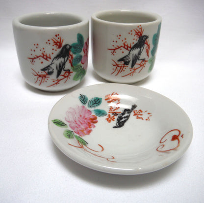 TWO TRADITIONAL CHINESE GREEN-TEA CUPS and ONE SAUCER: In Pink Lotus Flowers with Blackbird and Foliage, distributed by Ming Wo in Vancouver, BC, Canada