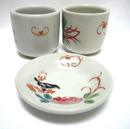 TWO TRADITIONAL CHINESE GREEN-TEA CUPS and ONE SAUCER: In Pink Lotus Flowers with Blackbird and Foliage, distributed by Ming Wo in Vancouver, BC, Canada