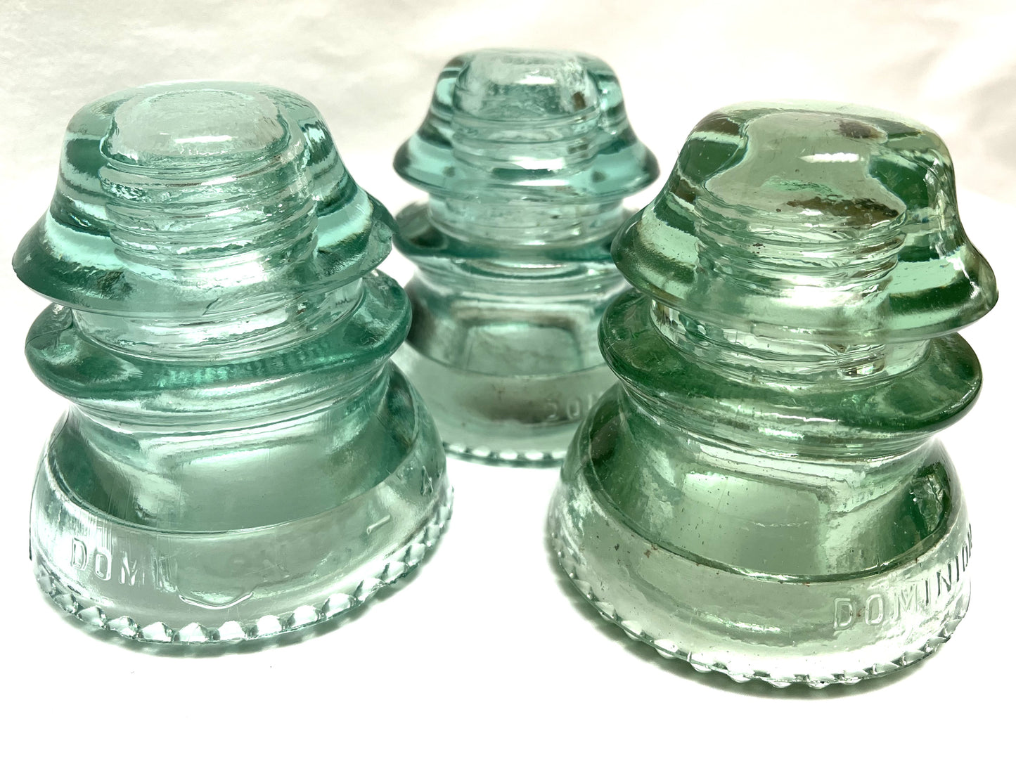 GLASS TELEGRAPH INSULATOR #42D, Made by DOMINION GLASS of CANADA in Misty Green Colour (SLIGHT DAMAGE-CHIPPED!)