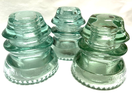 GLASS TELEGRAPH INSULATOR #42D, Made by DOMINION GLASS of CANADA in Misty Green Colour (SLIGHT DAMAGE-CHIPPED!)