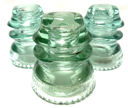 GLASS TELEGRAPH INSULATOR #42D, Made by DOMINION GLASS of CANADA in Misty Green Colour (SLIGHT DAMAGE-CHIPPED!)