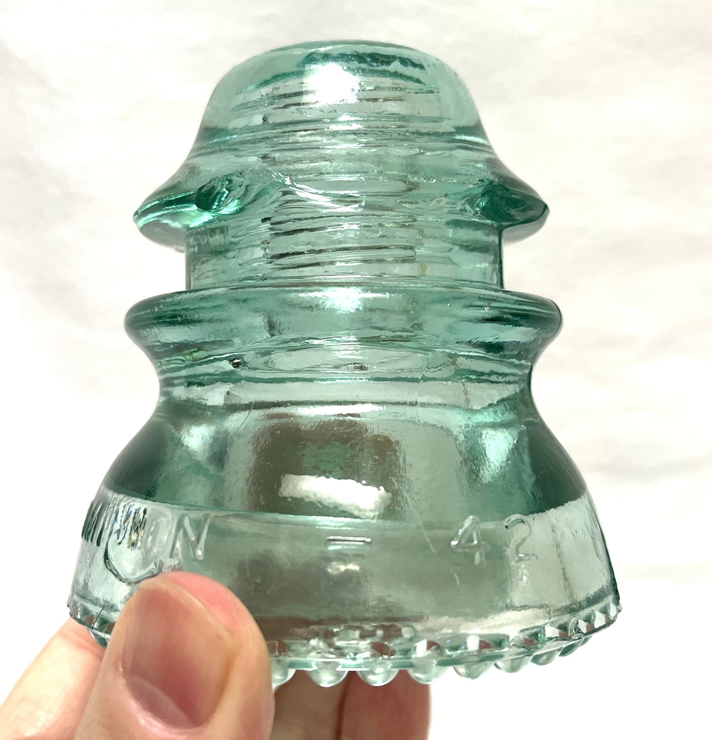 GLASS TELEGRAPH INSULATOR #42D, Made by DOMINION GLASS of CANADA in Misty Green Colour (SLIGHT DAMAGE-CHIPPED!)
