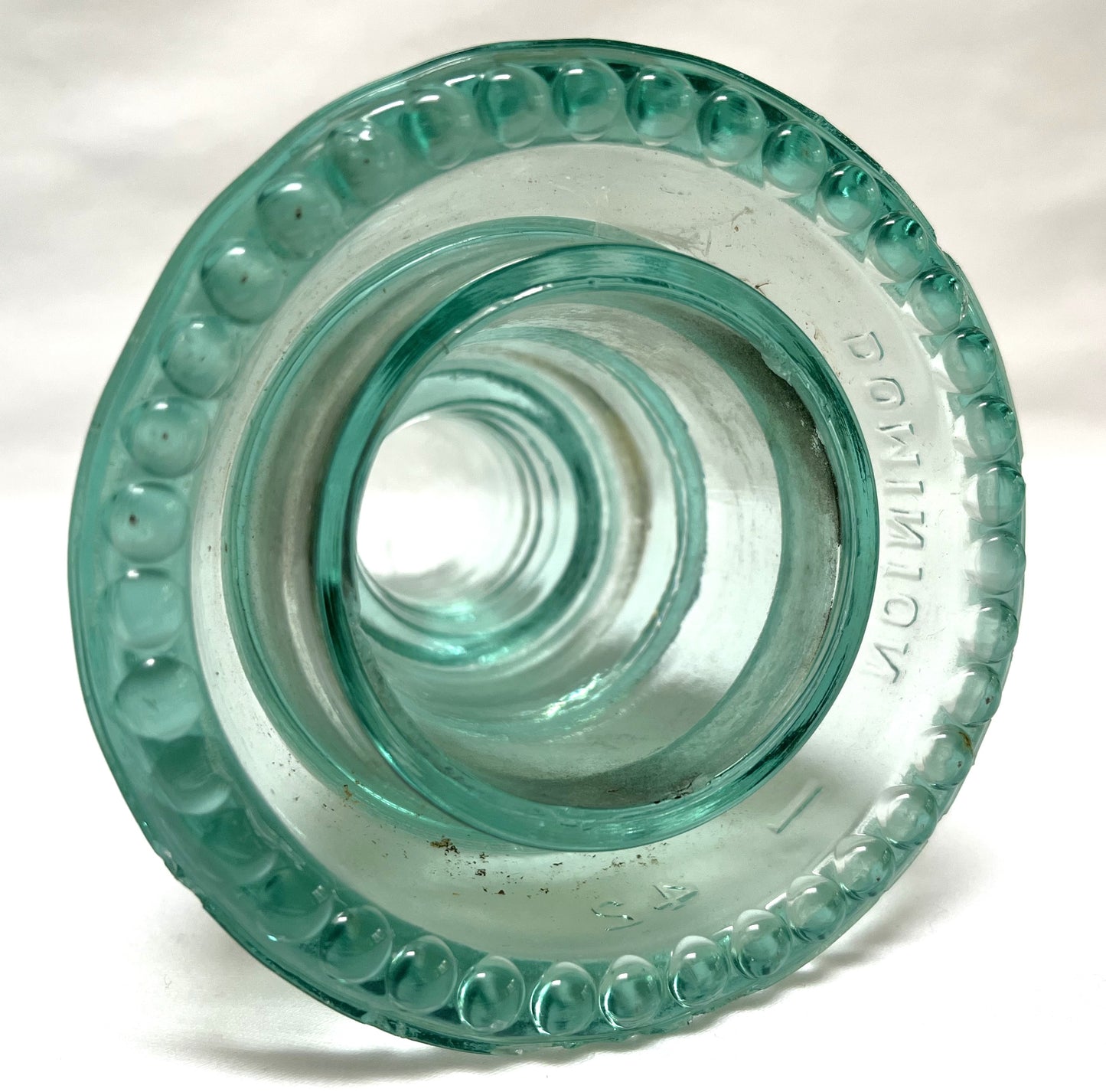 GLASS TELEGRAPH INSULATOR #42D, Made by DOMINION GLASS of CANADA in Misty Green Colour (SLIGHT DAMAGE-CHIPPED!)