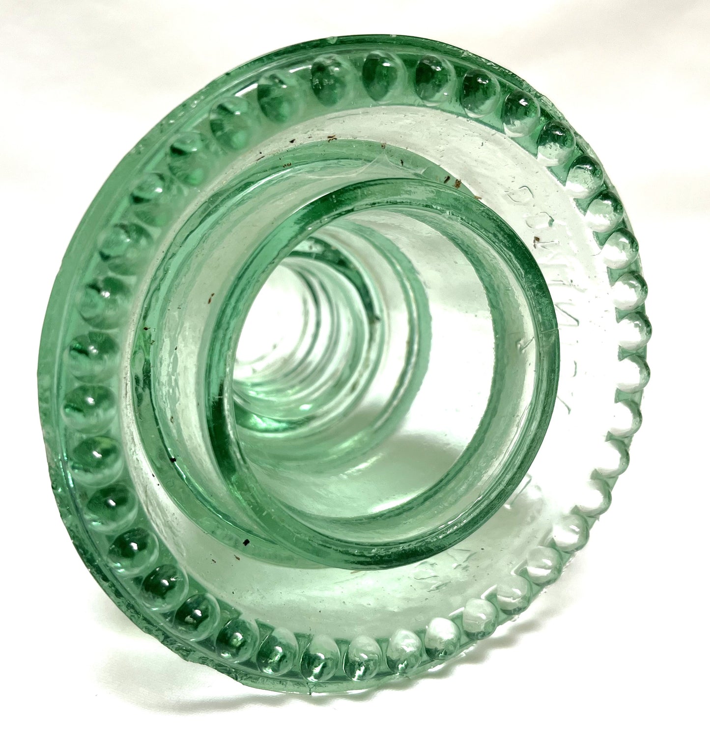 GLASS TELEGRAPH INSULATOR #42D, Made by DOMINION GLASS of CANADA in Misty Green Colour (SLIGHT DAMAGE-CHIPPED!)