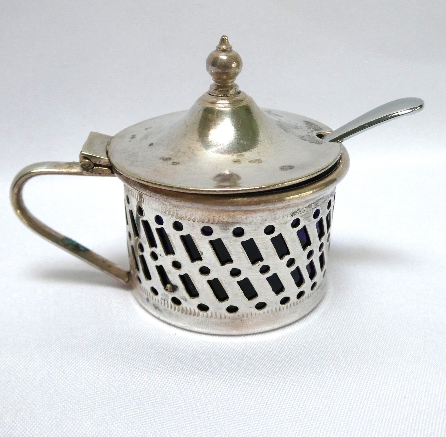 Antique Pierced Silverplated Mustard Pot or Salt Cellar, with a hinged lid and cobalt blue glass liner