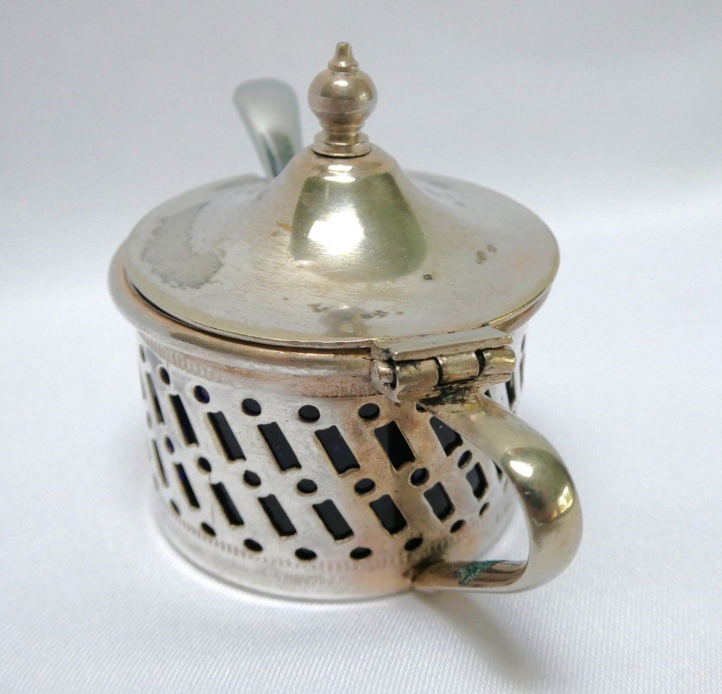 Antique Pierced Silverplated Mustard Pot or Salt Cellar, with a hinged lid and cobalt blue glass liner