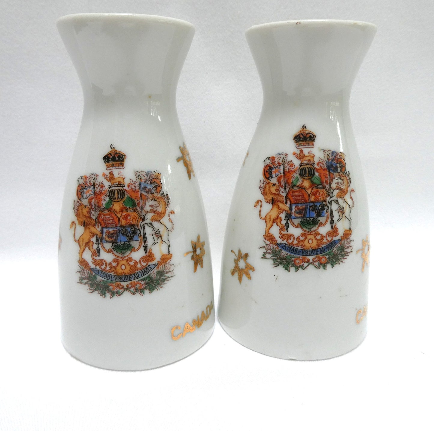 Vintage 1960’s SALT AND PEPPER SHAKER, Featuring the Royal Canadian Mounted Police (RCMP) AND The Official Coat of Arms of CANADA!