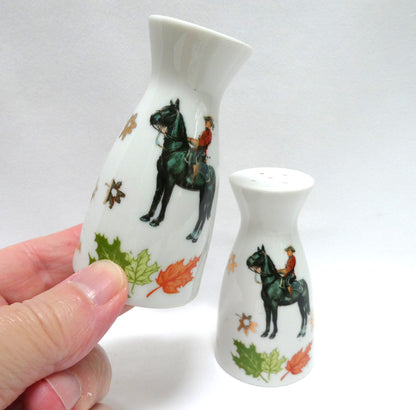 Vintage 1960’s SALT AND PEPPER SHAKER, Featuring the Royal Canadian Mounted Police (RCMP) AND The Official Coat of Arms of CANADA!