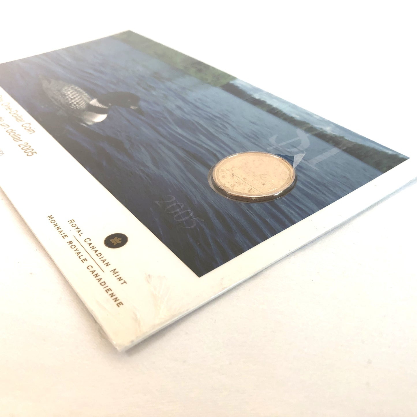 2005 Canadian Official First Day One-Dollar Coin: The $1 Loonie's 1st Day Issue in Original Presentation Folder (Mintage of only 5000)