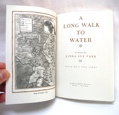 A LONG WALK TO WATER, A Novel Based on a True Story, by Linda Sue Park (2010 1st Ed.)