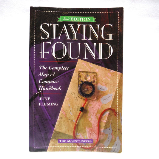STAYING FOUND, The Complete Map & Compass Handbook by The Mountaineers, and June Fleming, (1997 2nd. Ed.)
