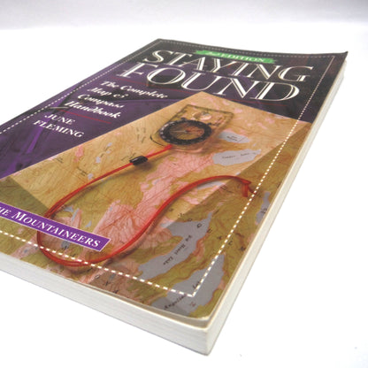 STAYING FOUND, The Complete Map & Compass Handbook by The Mountaineers, and June Fleming, (1997 2nd. Ed.)