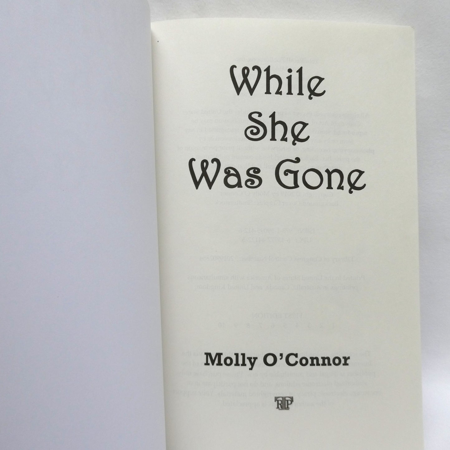 WHILE SHE WAS GONE, A Novel by Molly O'Connor (1st Ed. SIGNED)