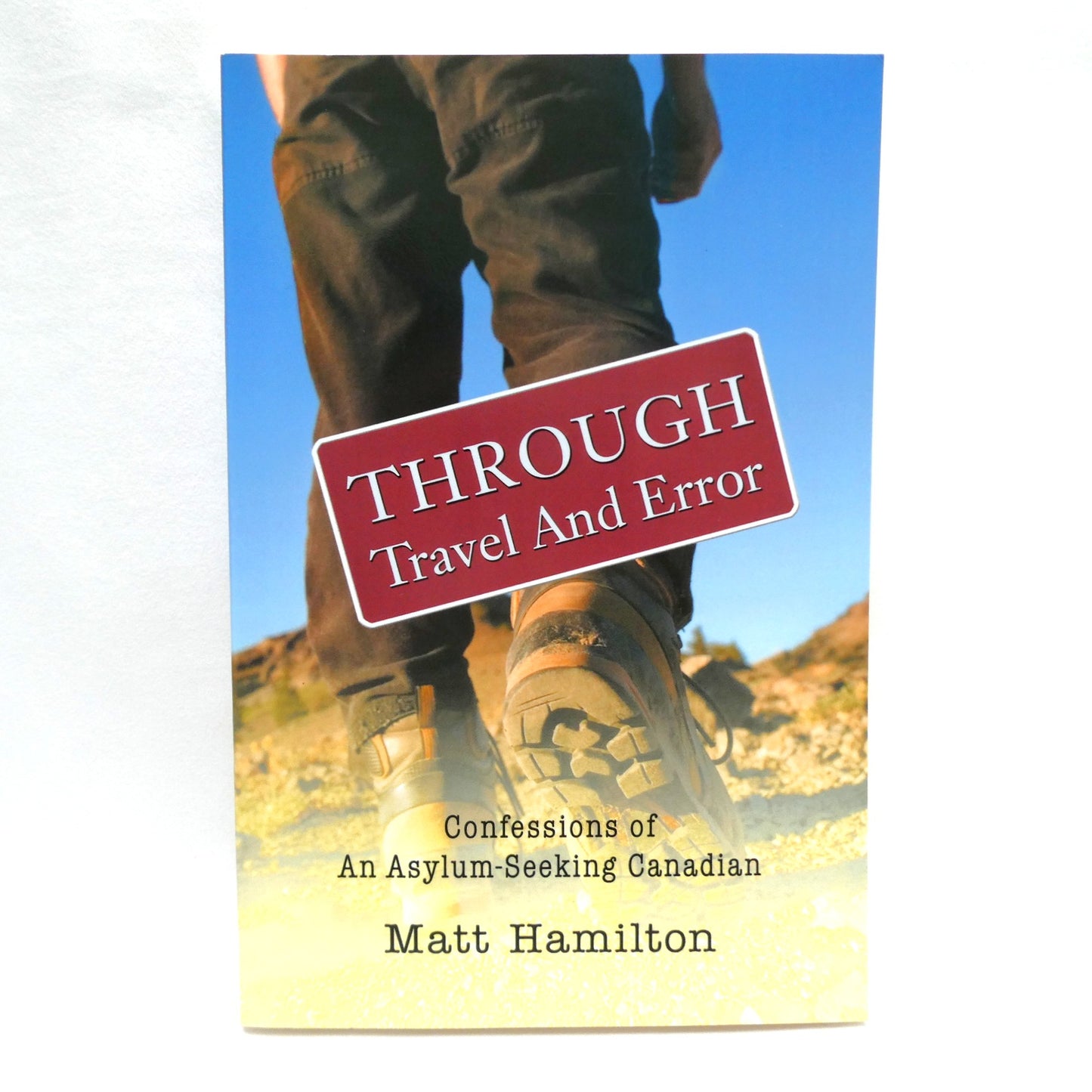 THROUGH TRAVEL AND ERROR, Confessions of An Asylum-Seeking Canadian, by Matt Hamilton (1st Ed. SIGNED)