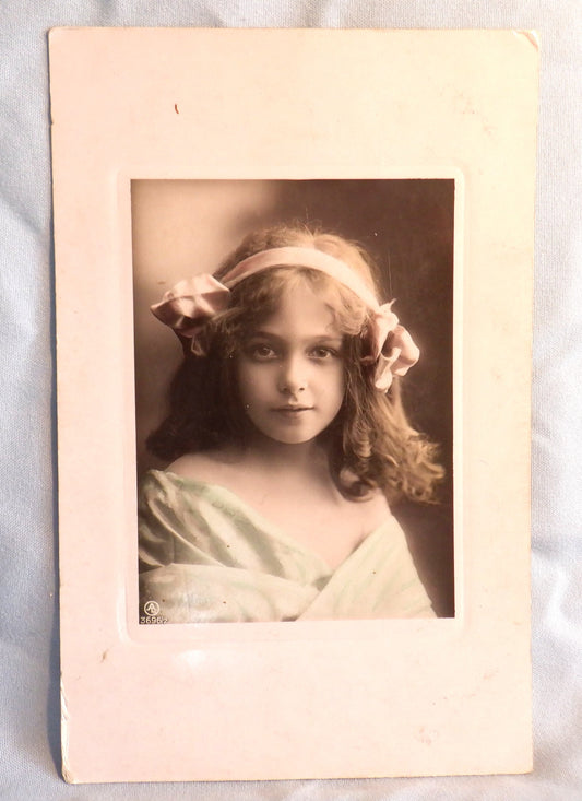 Antique Hand-Tinted German Postcard from 1910, Featuring "THE GIRL WITH A PINK BOW IN HER HAIR"