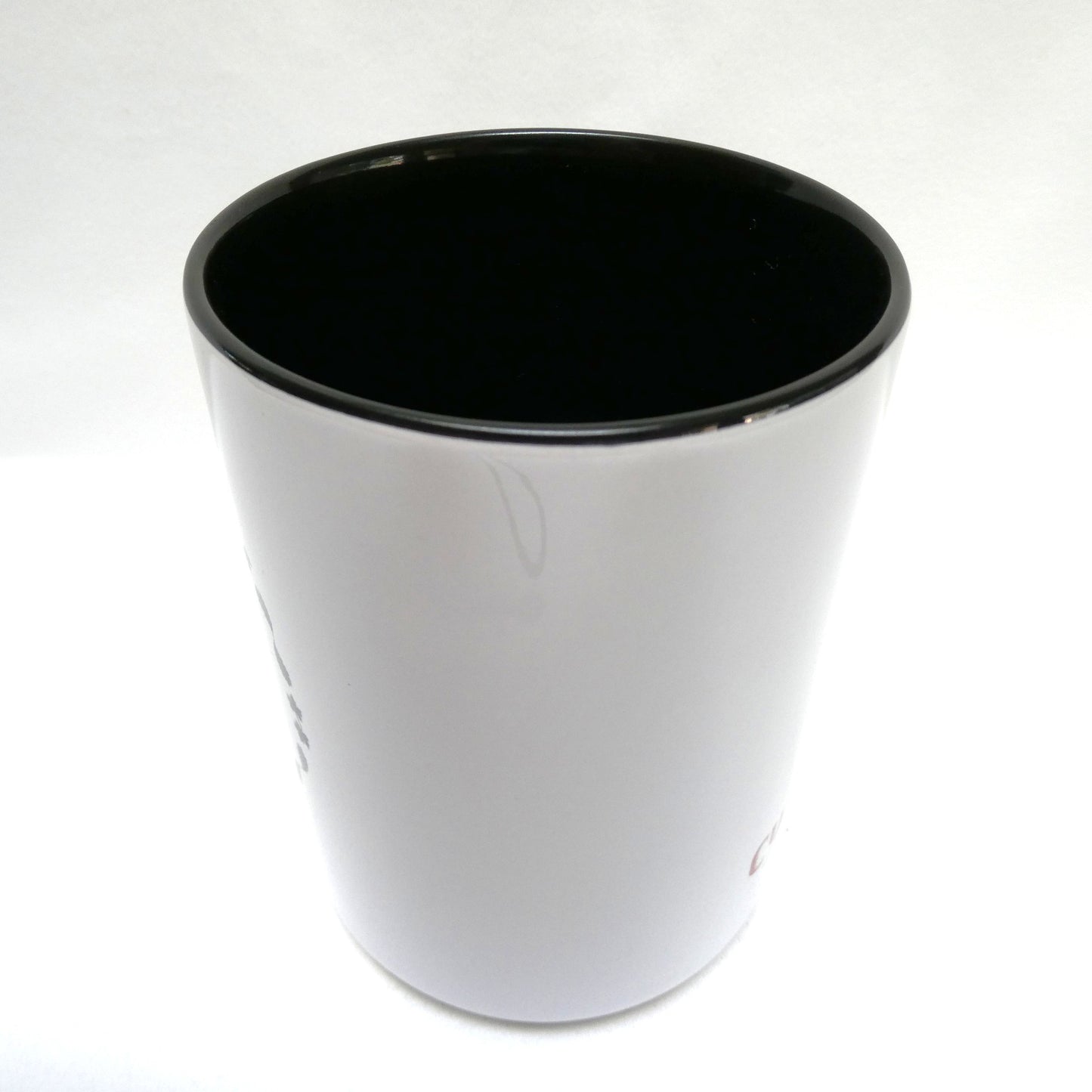 Ceramic Coffee Cup Two-Toned White & Black, Brand New from DODGE CITY ORIGINALS of Cumberland, BC