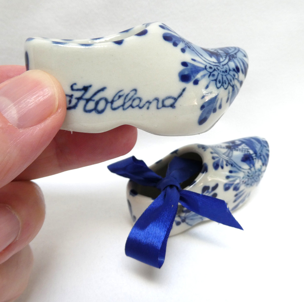 Vintage 3-Inch Pair of Ceramic Dutch Clogs by Delft of Holland, with Single Blue Ribbon