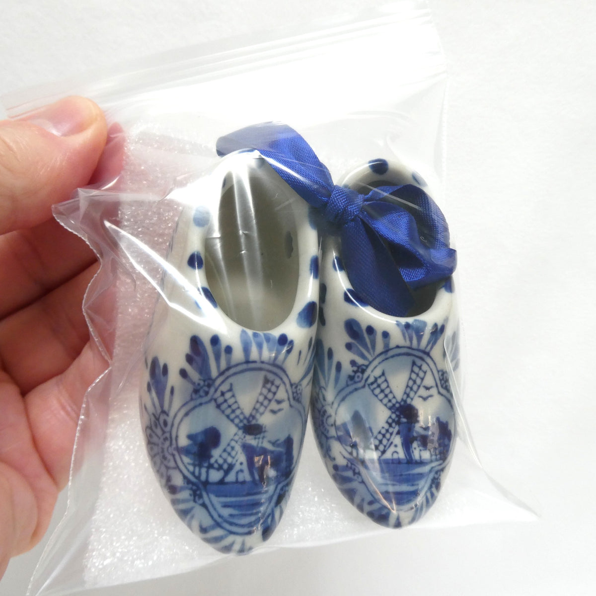 Vintage 3-Inch Pair of Ceramic Dutch Clogs by Delft of Holland, with Single Blue Ribbon