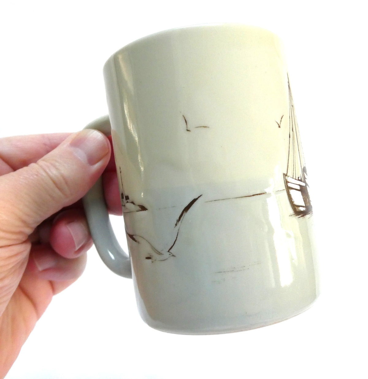 Otagiri Japanese Stoneware Coffee Mug Featuring an Embossed and Hand-Painted Canadian Maritime Coastal Fishing Village and Boat Scene