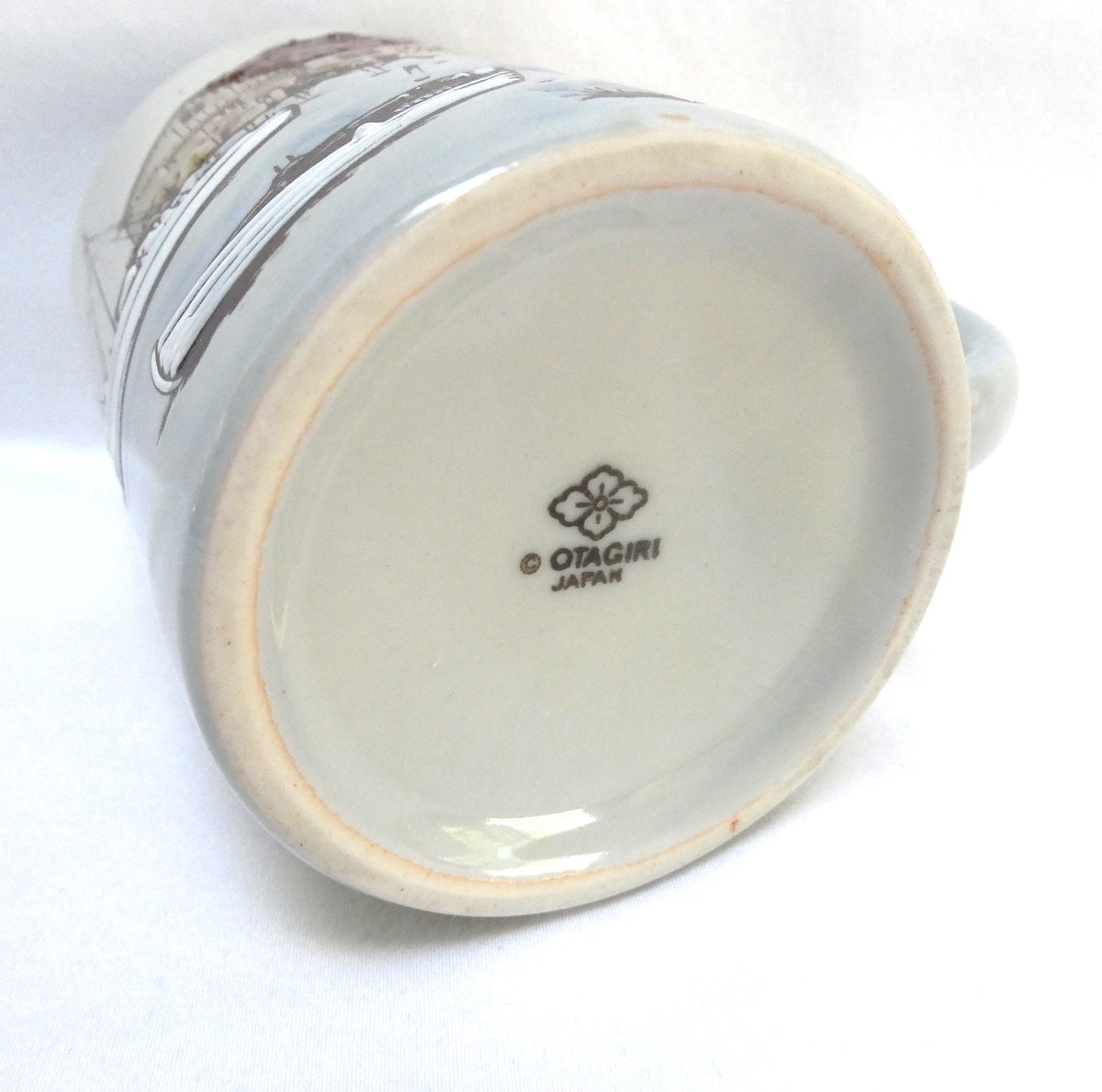 Otagiri Japanese Stoneware Coffee Mug Featuring an Embossed and Hand-Painted Canadian Maritime Coastal Fishing Village and Boat Scene