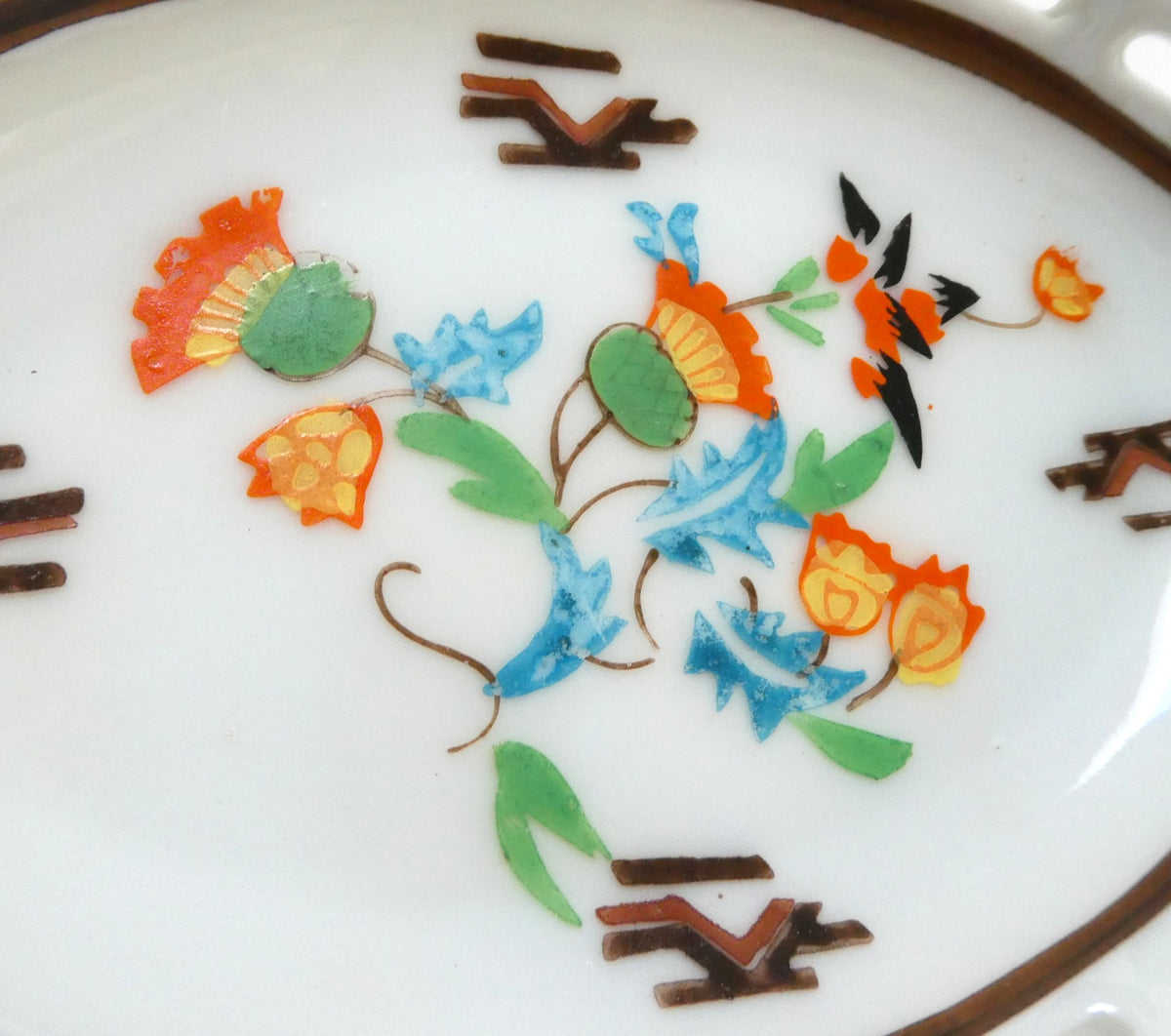 Vintage reticulated porcelain trinket dish featuring a delicate, pierced lattice rim and integrated small handles from Japan