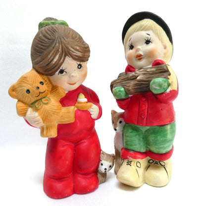 Pair of Vintage 1970's 'Sugarplum' Christmas Holiday Porcelain Pomander Figurines: Featuring Girl in Red PJ's and Boy Carrying Wood