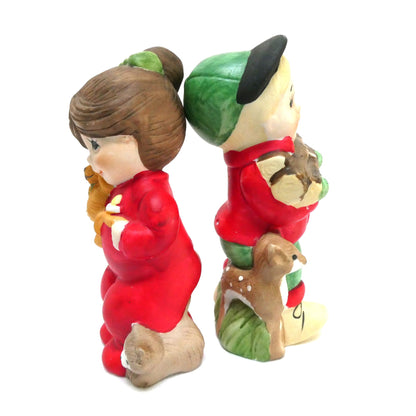 Pair of Vintage 1970's 'Sugarplum' Christmas Holiday Porcelain Pomander Figurines: Featuring Girl in Red PJ's and Boy Carrying Wood