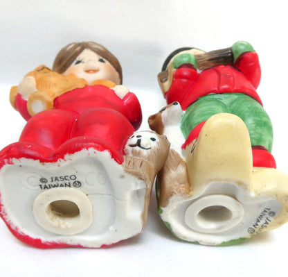 Pair of Vintage 1970's 'Sugarplum' Christmas Holiday Porcelain Pomander Figurines: Featuring Girl in Red PJ's and Boy Carrying Wood