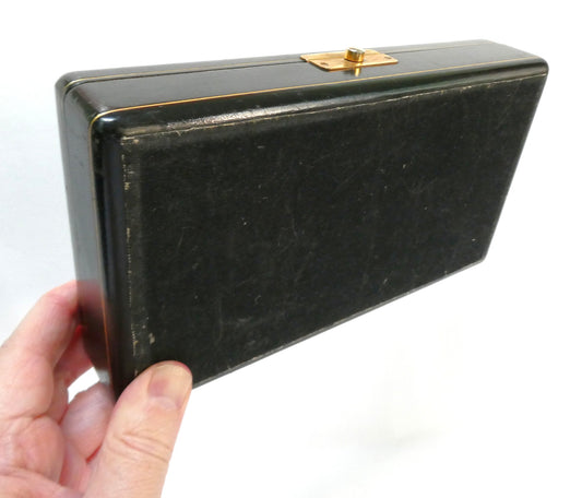 Mid-Century Italian Black Leather Jewelry Box with a gold-gilded border, secure front latch, and a striking deep red velvet lining