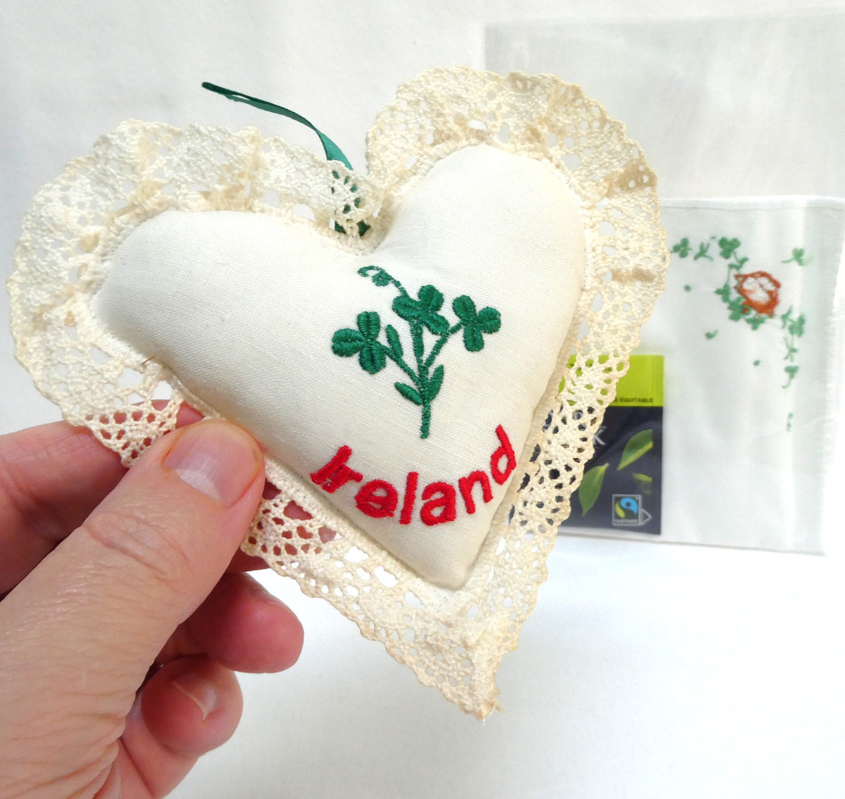 A Collection of Vintage Items Celebrating IRISH ARTS AND CRAFTS: Including Irish Pillow, Shamrock Ceramic Trinket Tray, Embroidered Tea Napkin, and Ladies Linen Handkerchief Set