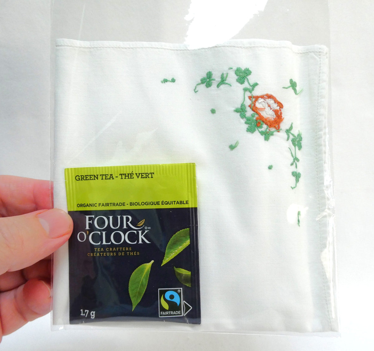A Collection of Vintage Items Celebrating IRISH ARTS AND CRAFTS: Including Irish Pillow, Shamrock Ceramic Trinket Tray, Embroidered Tea Napkin, and Ladies Linen Handkerchief Set