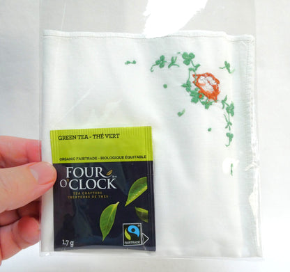 A Collection of Vintage Items Celebrating IRISH ARTS AND CRAFTS: Including Irish Pillow, Shamrock Ceramic Trinket Tray, Embroidered Tea Napkin, and Ladies Linen Handkerchief Set