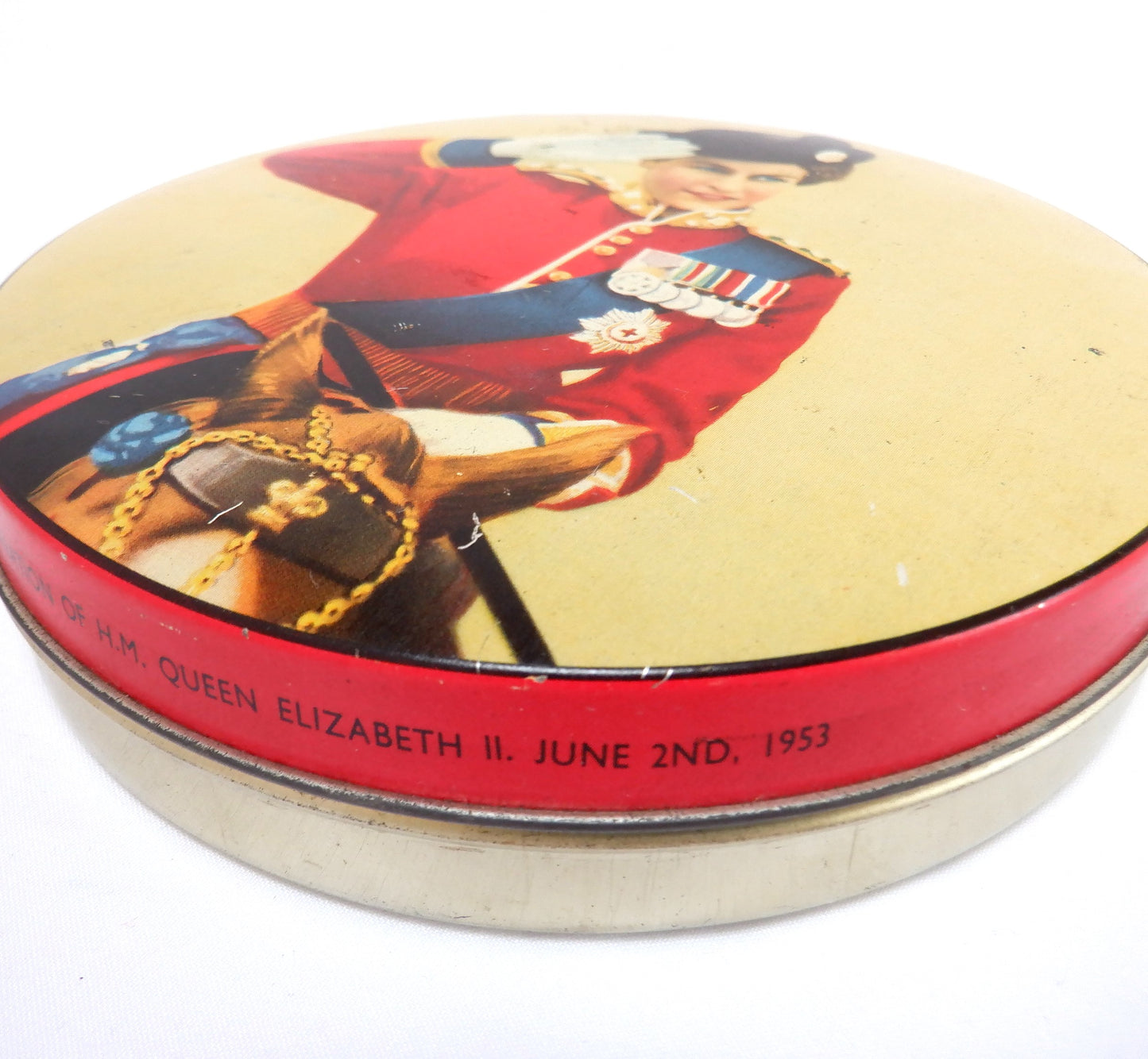 A Coronation Vintage Tin by Henry Thorne & Co. of HRM Queen Elizabeth II, Taking Salute on Horseback, 1953