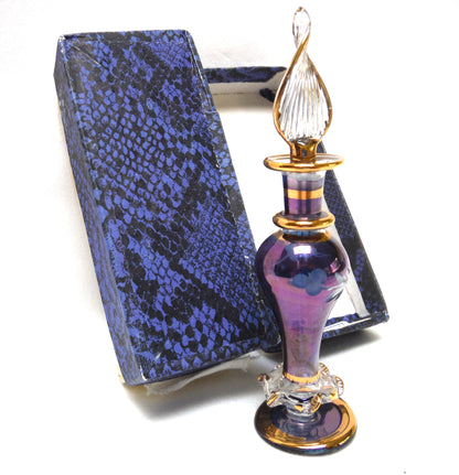 MINIATURE EGYPTIAN PERFUME BOTTLE: 'Nefertitis Tears 18 K gold glided, amethyst toned, mouth blown, hand-cut'