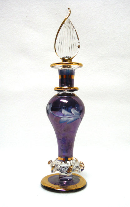 MINIATURE EGYPTIAN PERFUME BOTTLE: 'Nefertitis Tears 18 K gold glided, amethyst toned, mouth blown, hand-cut'